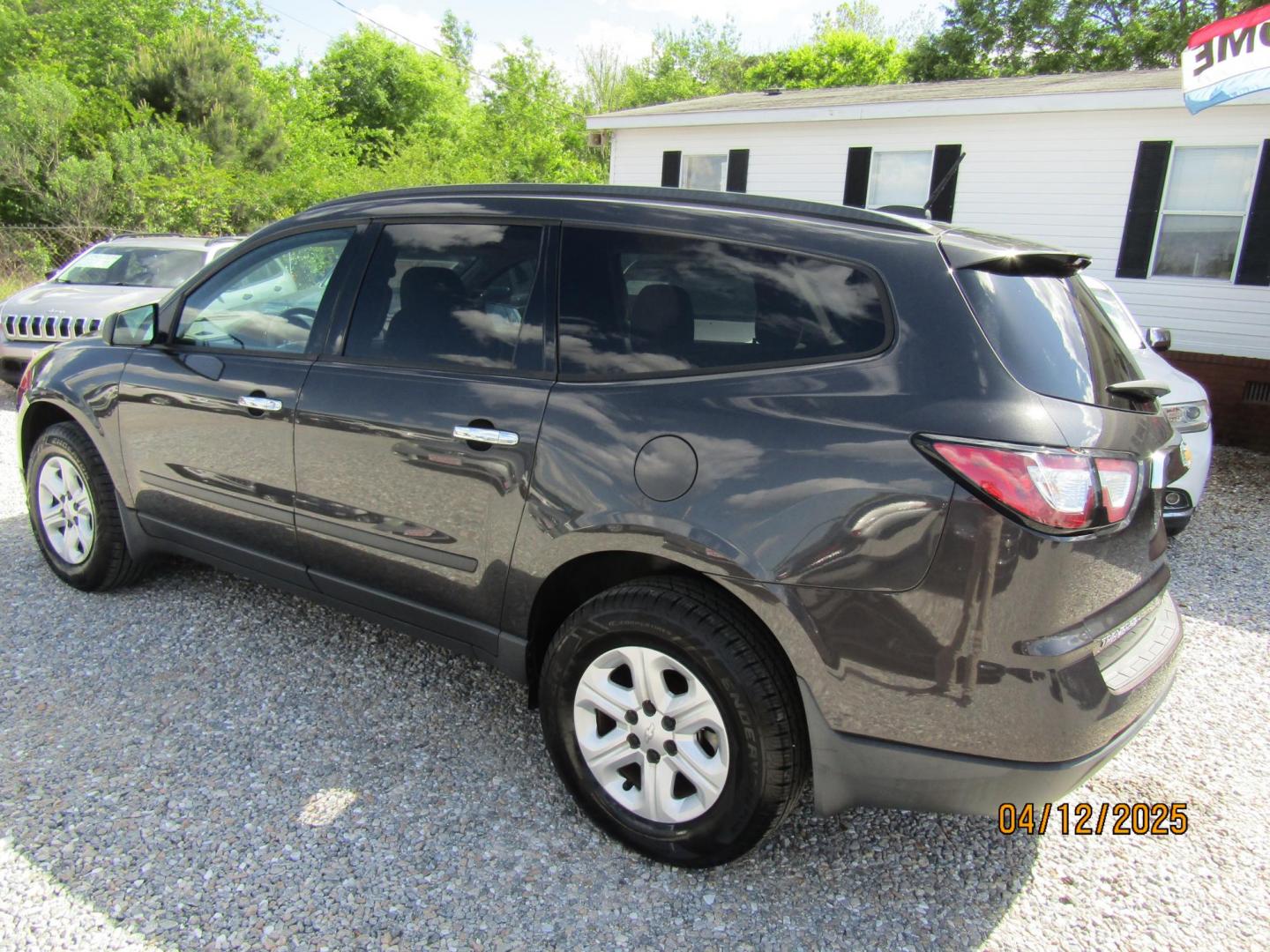 2017 Gray Chevrolet Traverse LS FWD w/PDC (1GNKRFEDXHJ) with an 3.6L V6 DOHC 24V engine, Automatic transmission, located at 15016 S Hwy 231, Midland City, AL, 36350, (334) 983-3001, 31.306210, -85.495277 - Photo#7