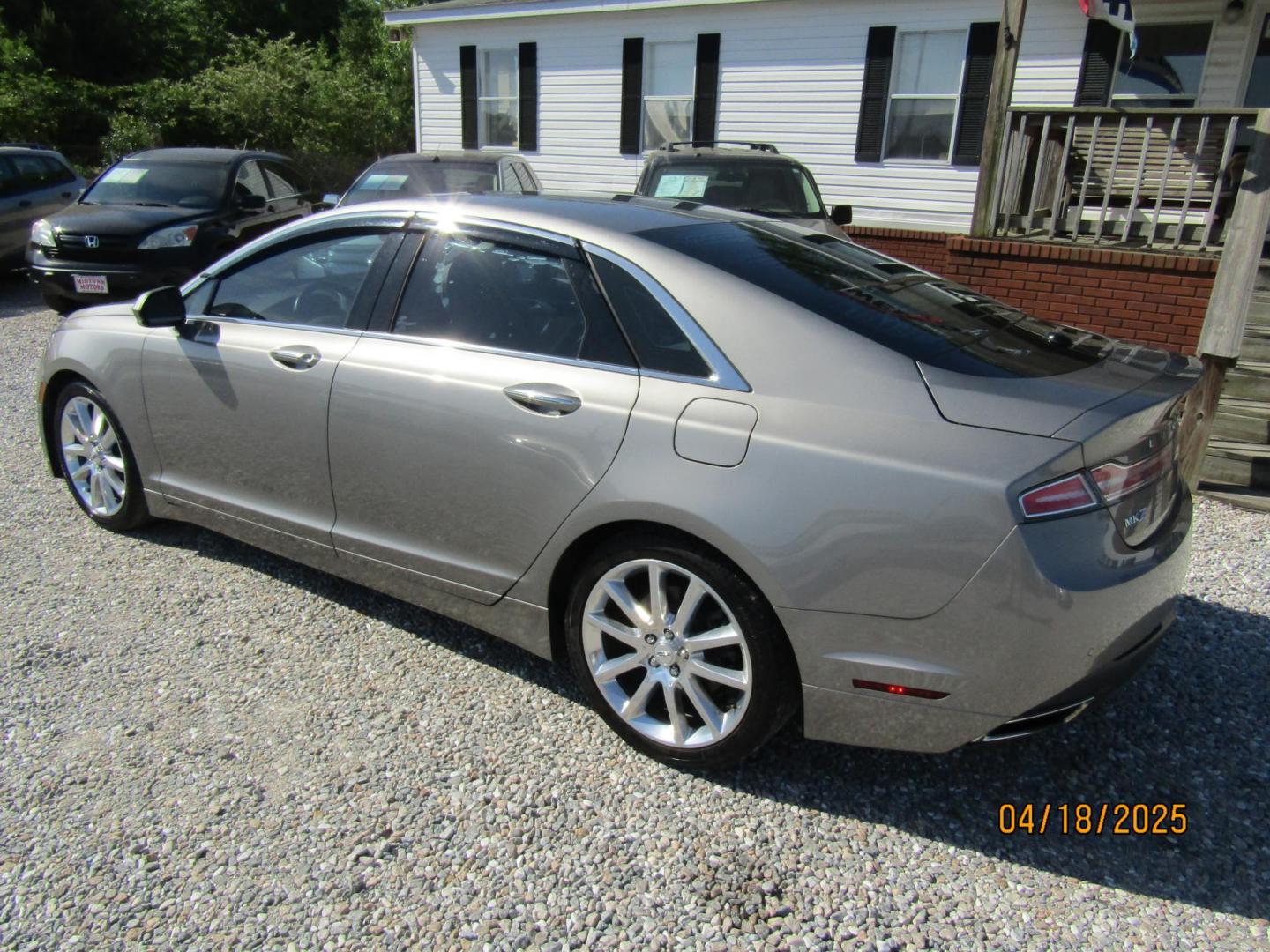 2016 Silver Lincoln MKZ FWD (3LN6L2G94GR) with an 2.0L L4 DOHC 16V engine, Automatic transmission, located at 15016 S Hwy 231, Midland City, AL, 36350, (334) 983-3001, 31.306210, -85.495277 - Photo#5