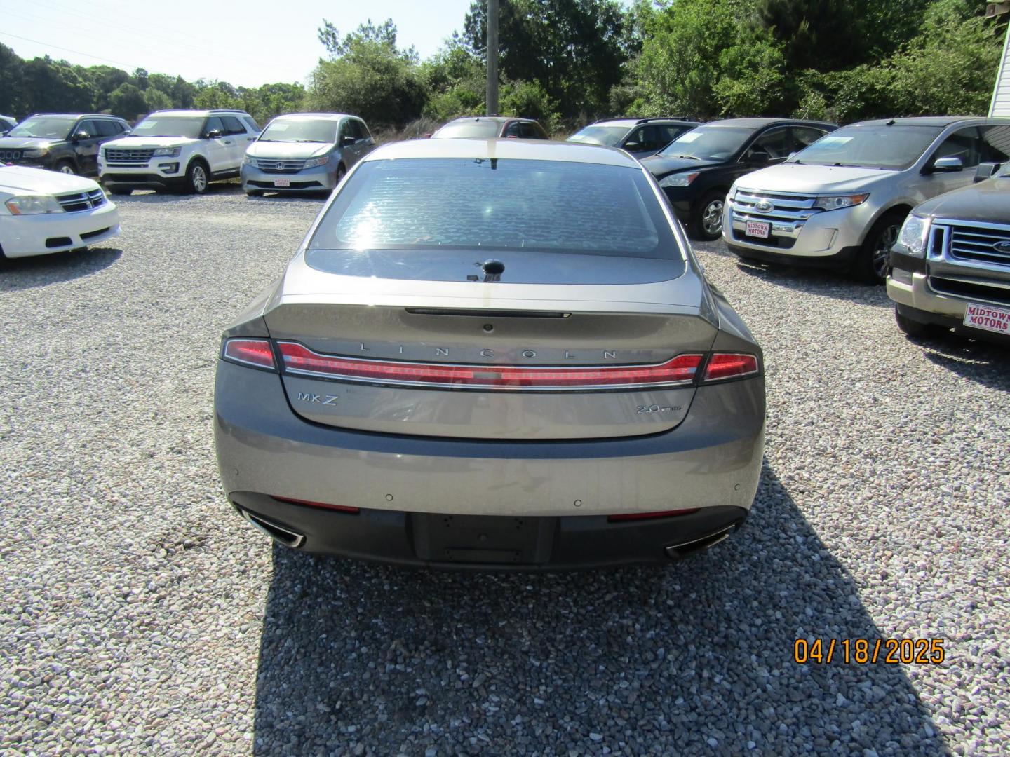 2016 Silver Lincoln MKZ FWD (3LN6L2G94GR) with an 2.0L L4 DOHC 16V engine, Automatic transmission, located at 15016 S Hwy 231, Midland City, AL, 36350, (334) 983-3001, 31.306210, -85.495277 - Photo#6