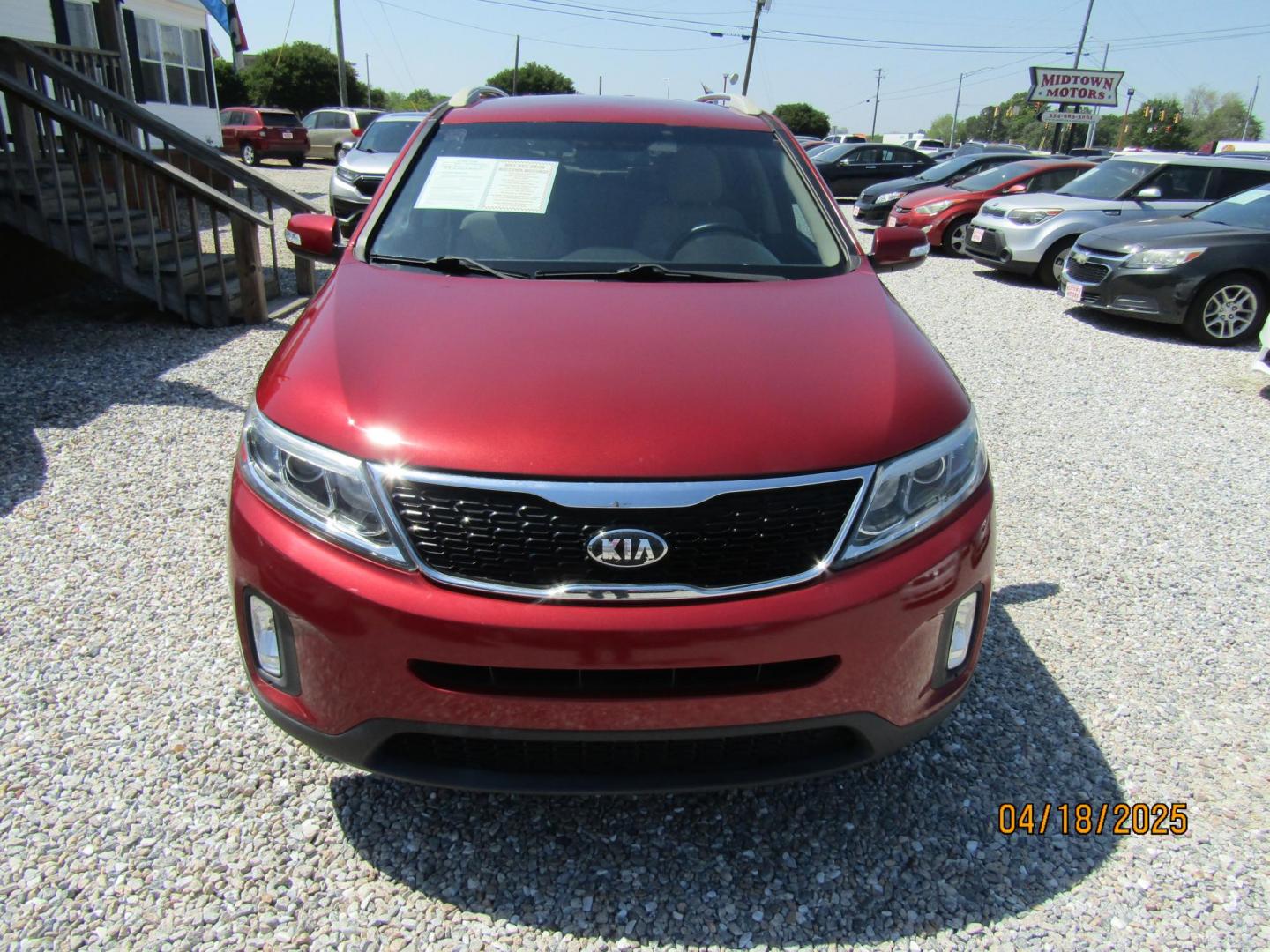 2015 Red Kia Sorento LX V6 FWD (5XYKT4A77FG) with an 3.3L V6 DOHC 24V engine, Automatic transmission, located at 15016 S Hwy 231, Midland City, AL, 36350, (334) 983-3001, 31.306210, -85.495277 - Photo#2