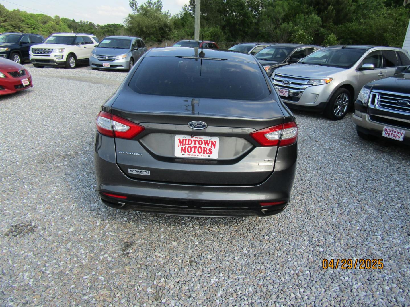 2016 Gray Ford Fusion SE (3FA6P0H92GR) with an 2.0L L4 DOHC 16V engine, Automatic transmission, located at 15016 S Hwy 231, Midland City, AL, 36350, (334) 983-3001, 31.306210, -85.495277 - Photo#6