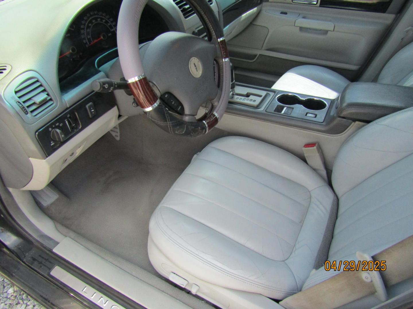 2004 Black Lincoln LS V6 Appearance (1LNHM86SX4Y) with an 3.0L V6 DOHC 24V engine, Automatic transmission, located at 15016 S Hwy 231, Midland City, AL, 36350, (334) 983-3001, 31.306210, -85.495277 - Photo#2