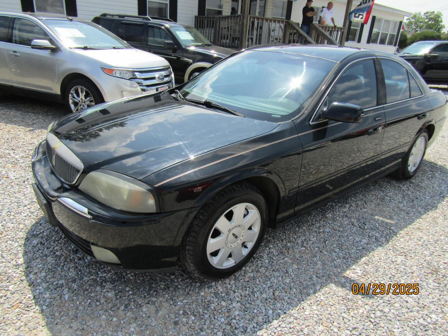 2004 Black Lincoln LS V6 Appearance (1LNHM86SX4Y) with an 3.0L V6 DOHC 24V engine, Automatic transmission, located at 15016 S Hwy 231, Midland City, AL, 36350, (334) 983-3001, 31.306210, -85.495277 - Photo#1