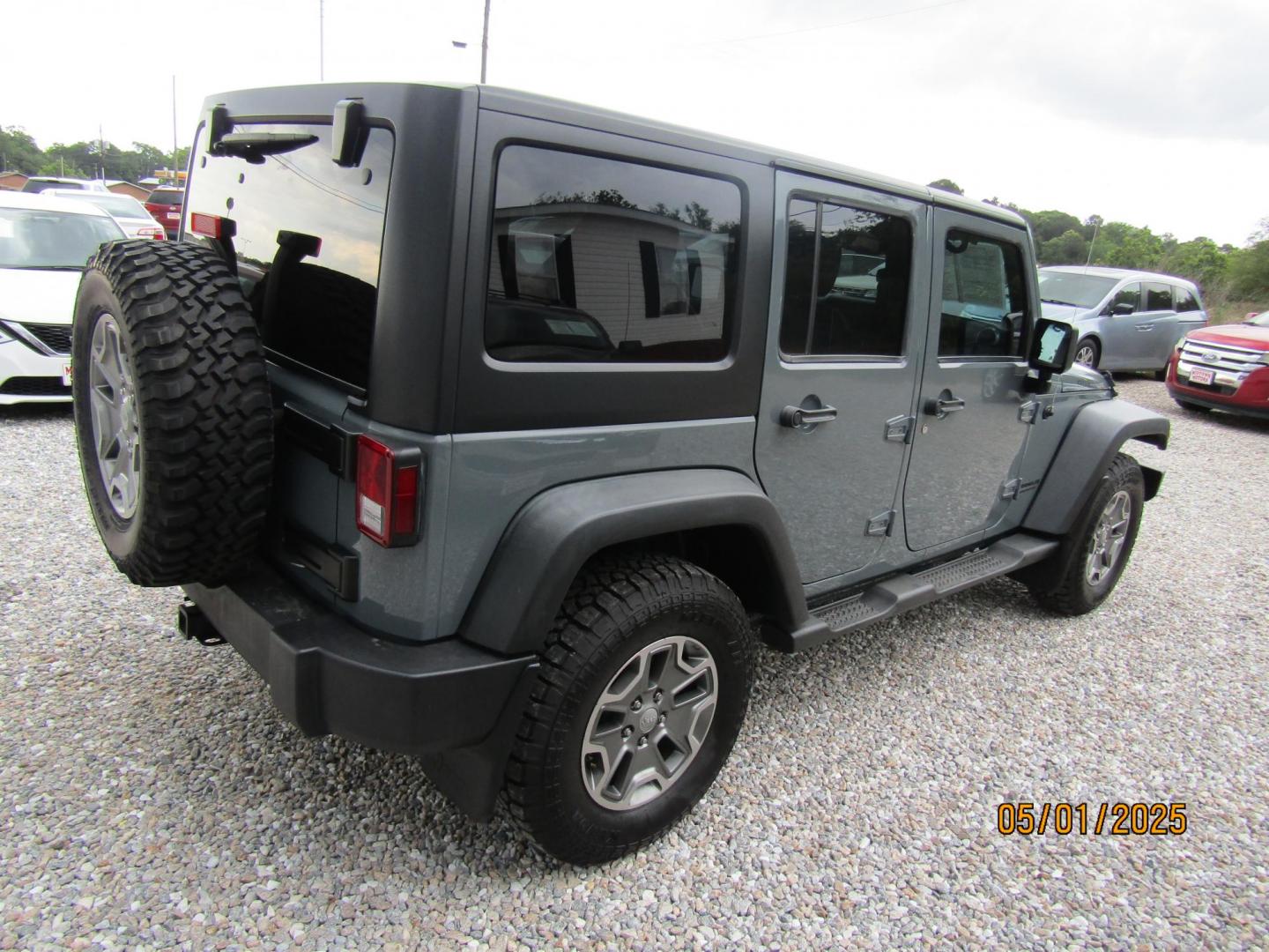 2014 Gray Jeep Wrangler Unlimited Rubicon 4WD (1C4HJWFG1EL) with an 3.6L V6 DOHC 24V FFV engine, Automatic transmission, located at 15016 S Hwy 231, Midland City, AL, 36350, (334) 983-3001, 31.306210, -85.495277 - Photo#7