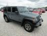2014 Gray Jeep Wrangler Unlimited Rubicon 4WD (1C4HJWFG1EL) with an 3.6L V6 DOHC 24V FFV engine, Automatic transmission, located at 15016 S Hwy 231, Midland City, AL, 36350, (334) 983-3001, 31.306210, -85.495277- Photo#0
