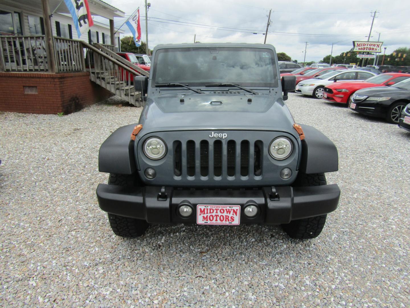 2014 Gray Jeep Wrangler Unlimited Rubicon 4WD (1C4HJWFG1EL) with an 3.6L V6 DOHC 24V FFV engine, Automatic transmission, located at 15016 S Hwy 231, Midland City, AL, 36350, (334) 983-3001, 31.306210, -85.495277- Photo#1