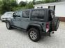 2014 Gray Jeep Wrangler Unlimited Rubicon 4WD (1C4HJWFG1EL) with an 3.6L V6 DOHC 24V FFV engine, Automatic transmission, located at 15016 S Hwy 231, Midland City, AL, 36350, (334) 983-3001, 31.306210, -85.495277- Photo#5
