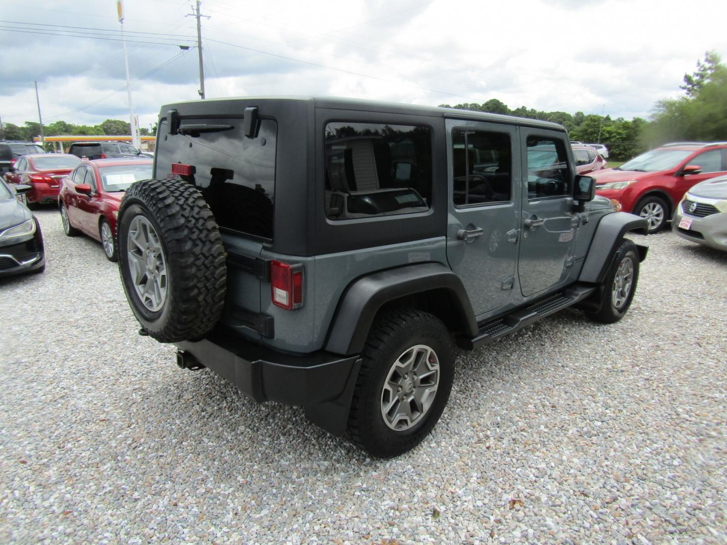 2014 Gray Jeep Wrangler Unlimited Rubicon 4WD (1C4HJWFG1EL) with an 3.6L V6 DOHC 24V FFV engine, Automatic transmission, located at 15016 S Hwy 231, Midland City, AL, 36350, (334) 983-3001, 31.306210, -85.495277- Photo#6