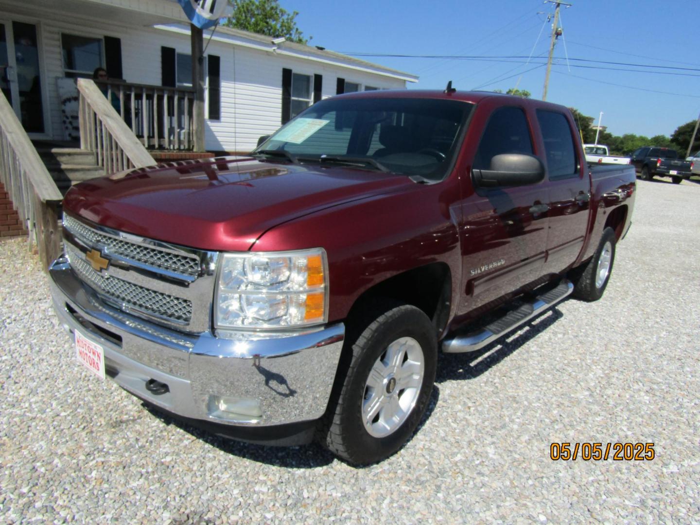 2013 Red Chevrolet Silverado 1500 LT Crew Cab 4WD (3GCPKSE79DG) with an 5.3L V8 OHV 16V FFV engine, Automatic transmission, located at 15016 S Hwy 231, Midland City, AL, 36350, (334) 983-3001, 31.306210, -85.495277 - Photo#2