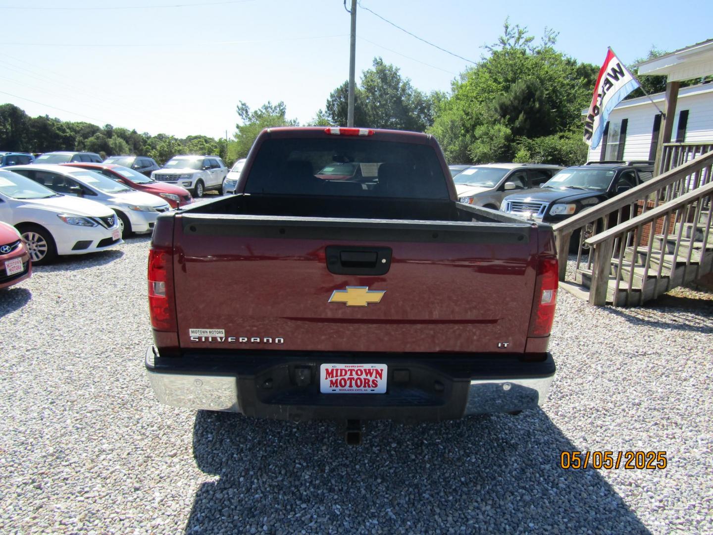 2013 Red Chevrolet Silverado 1500 LT Crew Cab 4WD (3GCPKSE79DG) with an 5.3L V8 OHV 16V FFV engine, Automatic transmission, located at 15016 S Hwy 231, Midland City, AL, 36350, (334) 983-3001, 31.306210, -85.495277 - Photo#6