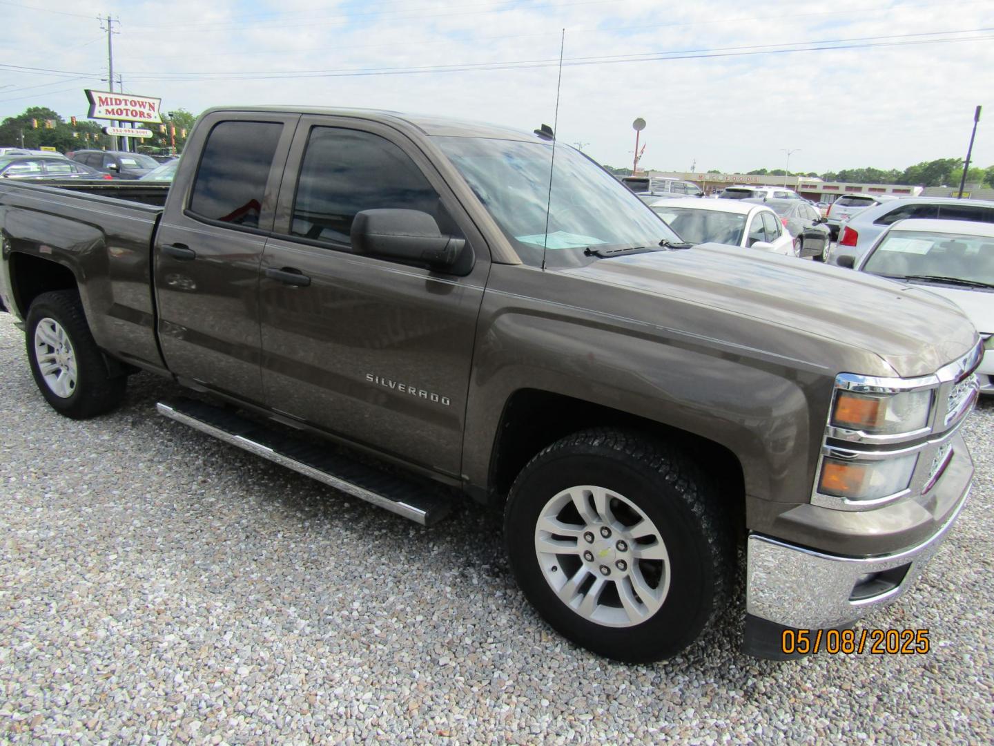 2014 Brown Chevrolet Silverado 1500 1LT Double Cab 2WD (1GCRCREH5EZ) with an 4.3L V6 OHV 12V engine, Automatic transmission, located at 15016 S Hwy 231, Midland City, AL, 36350, (334) 983-3001, 31.306210, -85.495277 - Photo#0