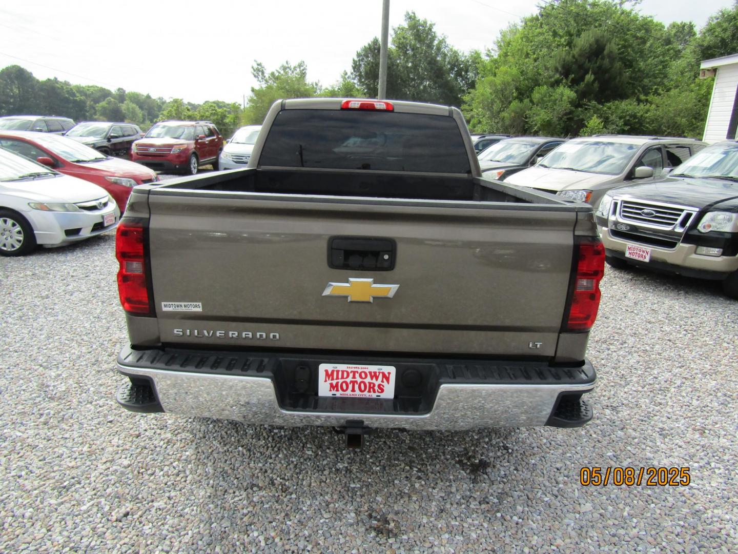 2014 Brown Chevrolet Silverado 1500 1LT Double Cab 2WD (1GCRCREH5EZ) with an 4.3L V6 OHV 12V engine, Automatic transmission, located at 15016 S Hwy 231, Midland City, AL, 36350, (334) 983-3001, 31.306210, -85.495277 - Photo#6