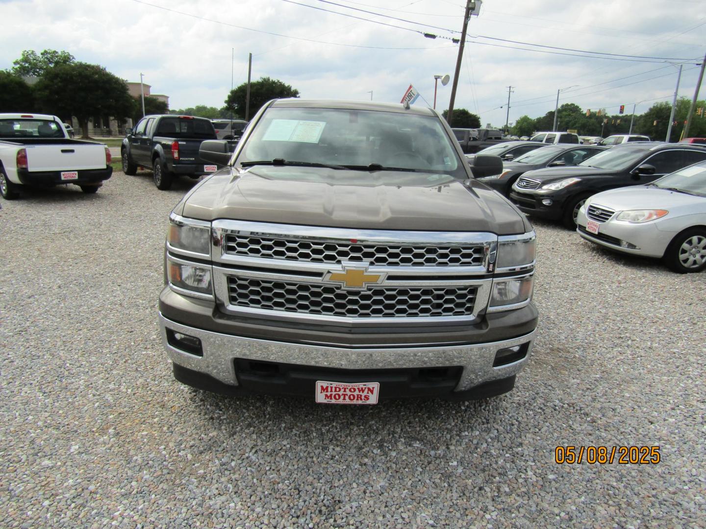 2014 Brown Chevrolet Silverado 1500 1LT Double Cab 2WD (1GCRCRECXEZ) with an 5.3L V8 OHV 16V engine, Automatic transmission, located at 15016 S Hwy 231, Midland City, AL, 36350, (334) 983-3001, 31.306210, -85.495277 - Photo#1