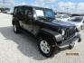 2016 Black Jeep Wrangler Unlimited Sport 4WD (1C4BJWDG5GL) with an 3.6L V6 DOHC 24V FFV engine, Automatic transmission, located at 15016 S Hwy 231, Midland City, AL, 36350, (334) 983-3001, 31.306210, -85.495277 - Photo#0