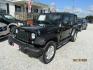 2016 Black Jeep Wrangler Unlimited Sport 4WD (1C4BJWDG5GL) with an 3.6L V6 DOHC 24V FFV engine, Automatic transmission, located at 15016 S Hwy 231, Midland City, AL, 36350, (334) 983-3001, 31.306210, -85.495277 - Photo#2