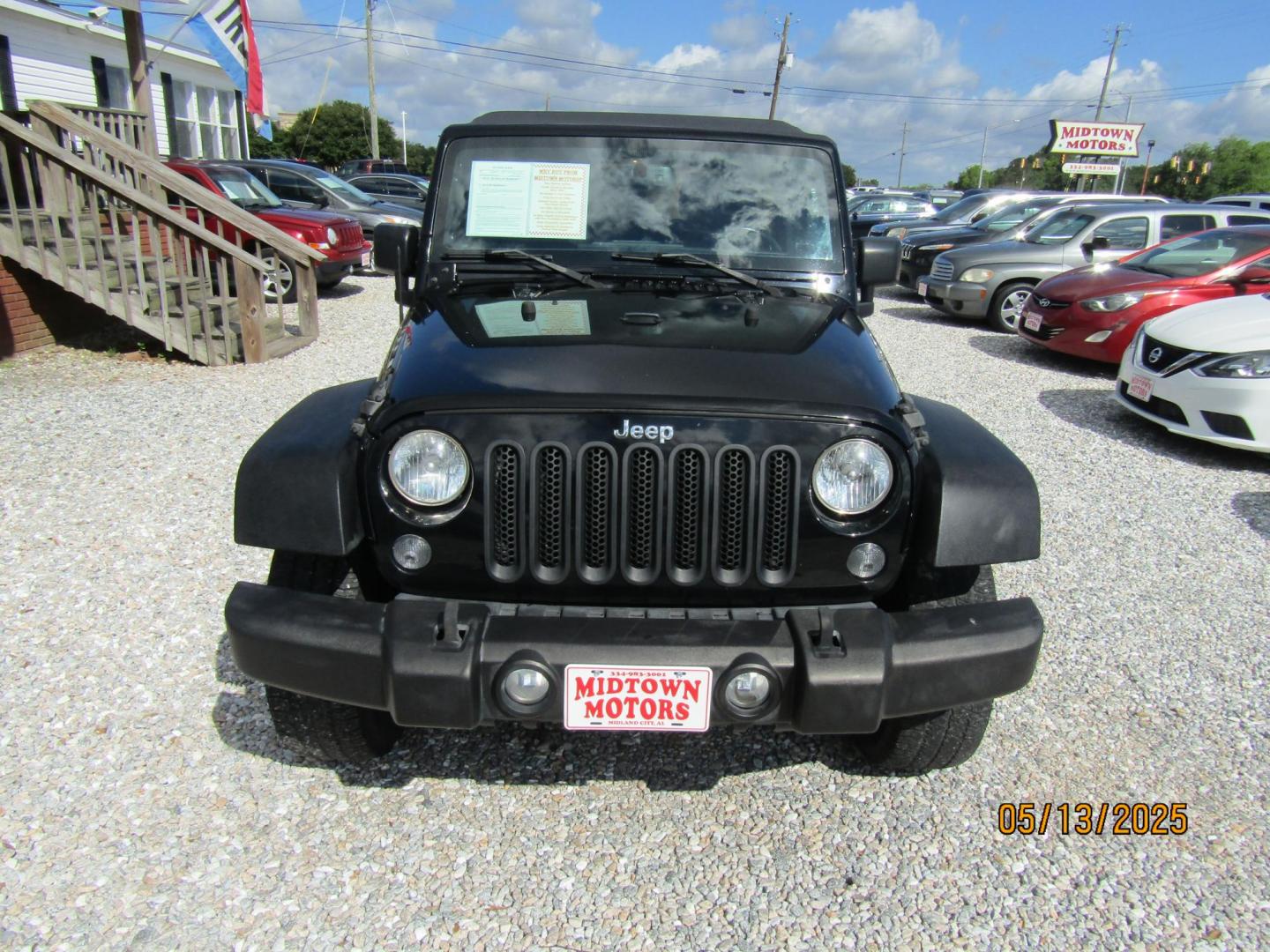2016 Black Jeep Wrangler Unlimited Sport 4WD (1C4BJWDG5GL) with an 3.6L V6 DOHC 24V FFV engine, Automatic transmission, located at 15016 S Hwy 231, Midland City, AL, 36350, (334) 983-3001, 31.306210, -85.495277 - Photo#1