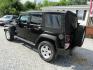 2016 Black Jeep Wrangler Unlimited Sport 4WD (1C4BJWDG5GL) with an 3.6L V6 DOHC 24V FFV engine, Automatic transmission, located at 15016 S Hwy 231, Midland City, AL, 36350, (334) 983-3001, 31.306210, -85.495277 - Photo#5