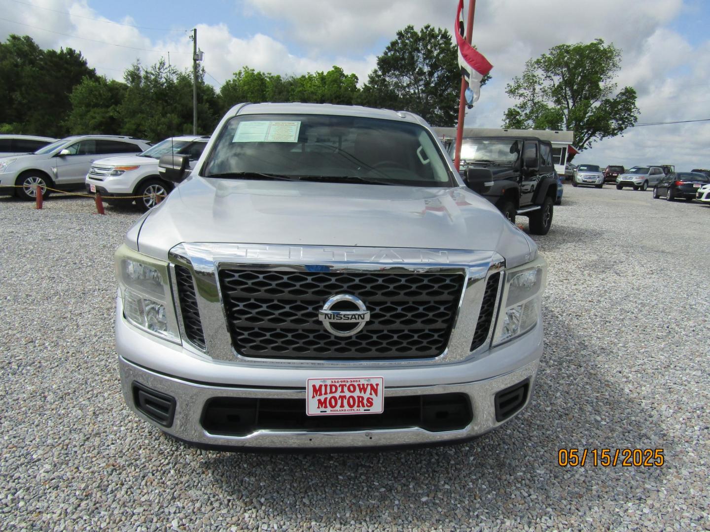 2017 Silver Nissan Titan S Crew Cab 2WD (1N6AA1EK5HN) with an 5.6L V8 DOHC 32V engine, Automatic transmission, located at 15016 S Hwy 231, Midland City, AL, 36350, (334) 983-3001, 31.306210, -85.495277 - Photo#1