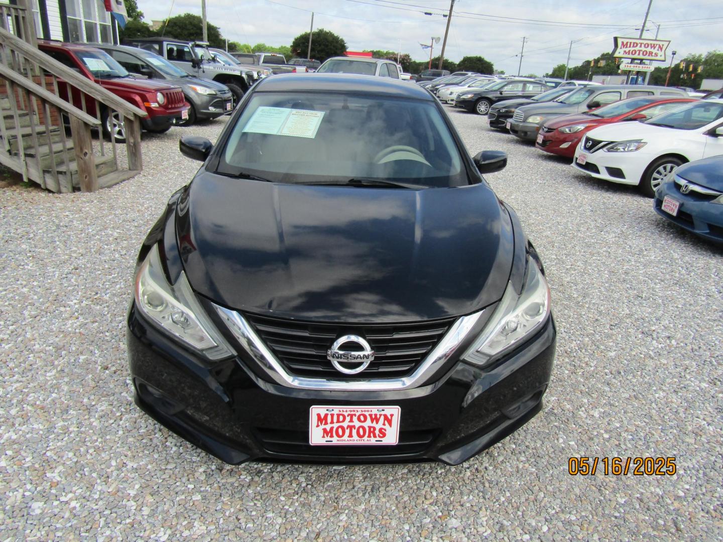 2018 Black Nissan Altima 2.5 (1N4AL3AP9JC) with an 2.5L L4 DOHC 16V engine, Automatic transmission, located at 15016 S Hwy 231, Midland City, AL, 36350, (334) 983-3001, 31.306210, -85.495277 - Photo#1