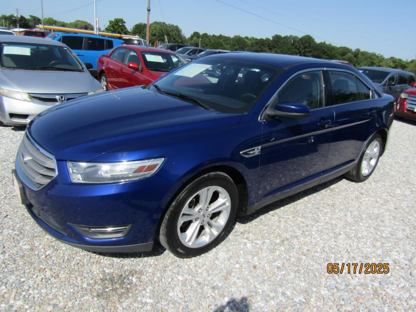 2013 Blue Ford Taurus SEL FWD (1FAHP2E88DG) with an 3.5L V6 DOHC 24V engine, Automatic transmission, located at 15016 S Hwy 231, Midland City, AL, 36350, (334) 983-3001, 31.306210, -85.495277 - Photo#2