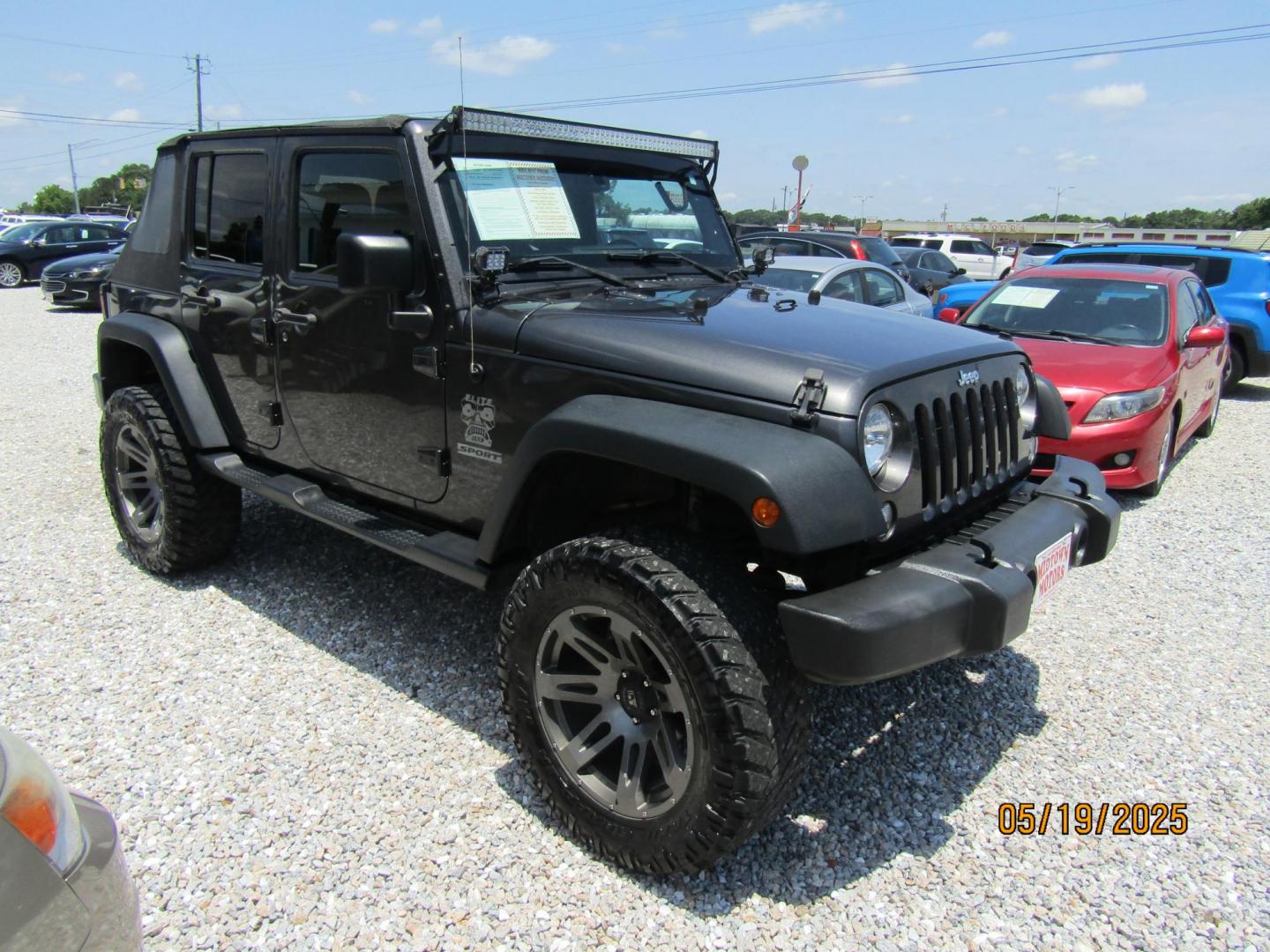 2017 Gray Jeep Wrangler Unlimited Sport 4WD (1C4BJWDG2HL) with an 3.6L V6 DOHC 24V FFV engine, Automatic transmission, located at 15016 S Hwy 231, Midland City, AL, 36350, (334) 983-3001, 31.306210, -85.495277 - Photo#0