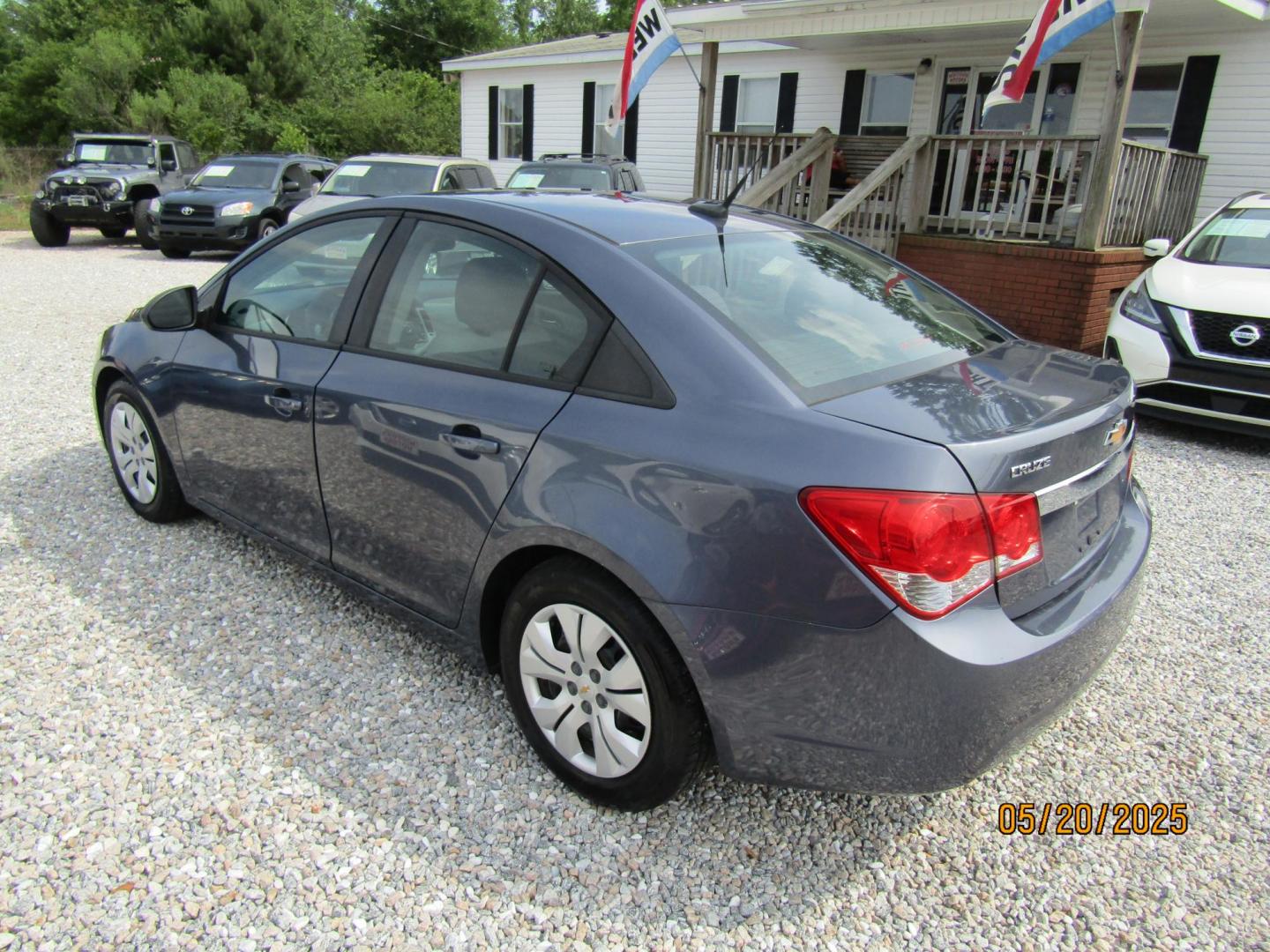 2013 Blue Chevrolet Cruze LS Auto (1G1PA5SHXD7) with an 1.8L L4 DOHC 16V FFV engine, Automatic transmission, located at 15016 S Hwy 231, Midland City, AL, 36350, (334) 983-3001, 31.306210, -85.495277 - Photo#5