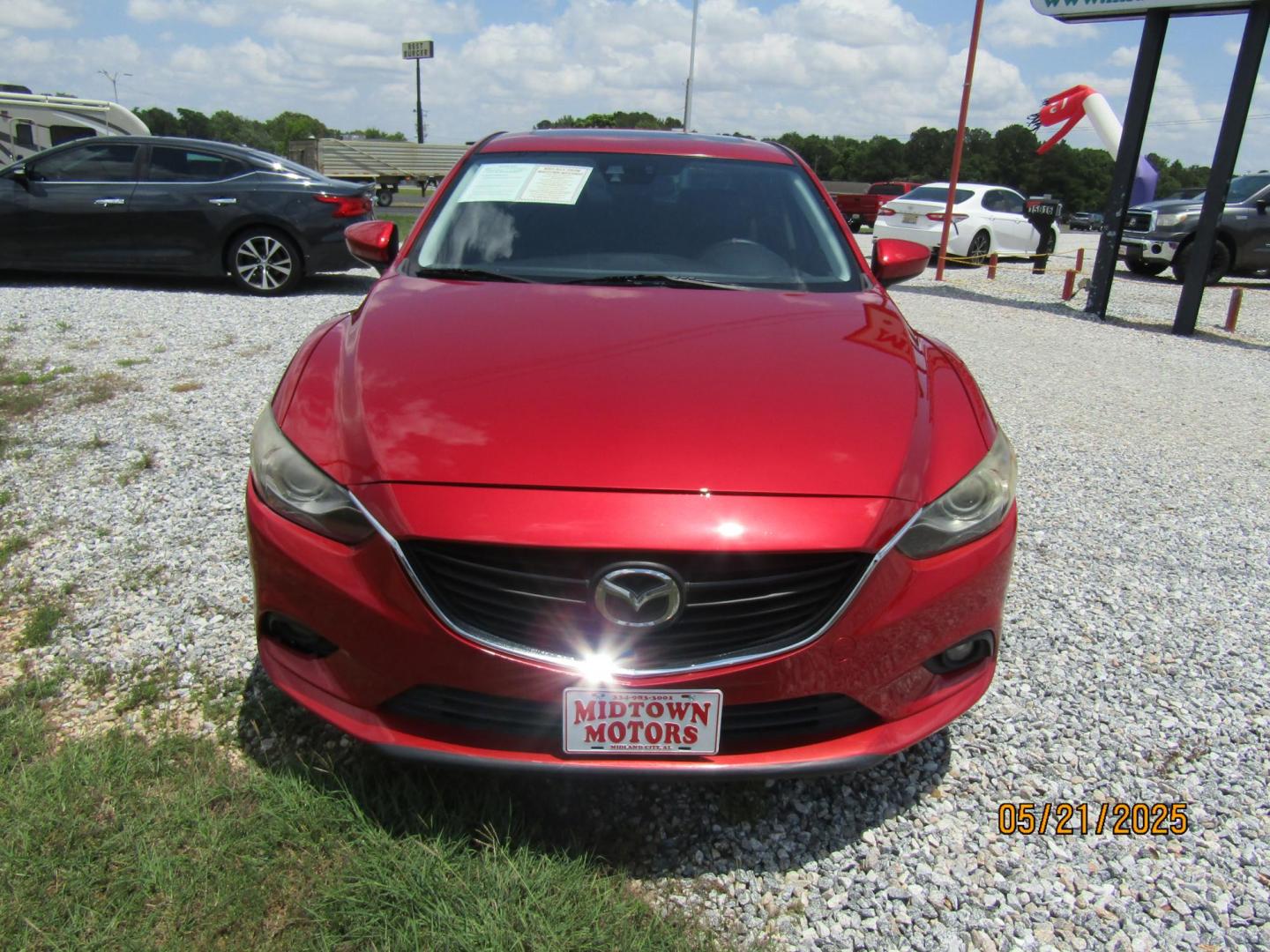 2015 Red Mazda Mazda6 i Grand Touring (JM1GJ1W61F1) with an 2.5L L4 DOHC 16V engine, Automatic transmission, located at 15016 S Hwy 231, Midland City, AL, 36350, (334) 983-3001, 31.306210, -85.495277 - Photo#1