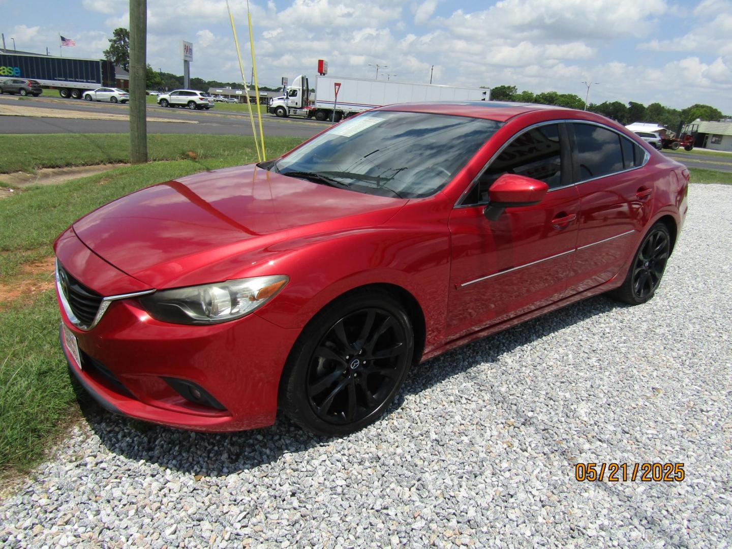 2015 Red Mazda Mazda6 i Grand Touring (JM1GJ1W61F1) with an 2.5L L4 DOHC 16V engine, Automatic transmission, located at 15016 S Hwy 231, Midland City, AL, 36350, (334) 983-3001, 31.306210, -85.495277 - Photo#2
