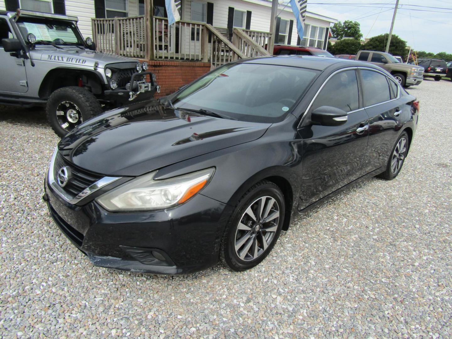 2017 Black Nissan Altima 2.5 S (1N4AL3AP7HC) with an 2.5L L4 DOHC 16V engine, Automatic transmission, located at 15016 S Hwy 231, Midland City, AL, 36350, (334) 983-3001, 31.306210, -85.495277 - Photo#2