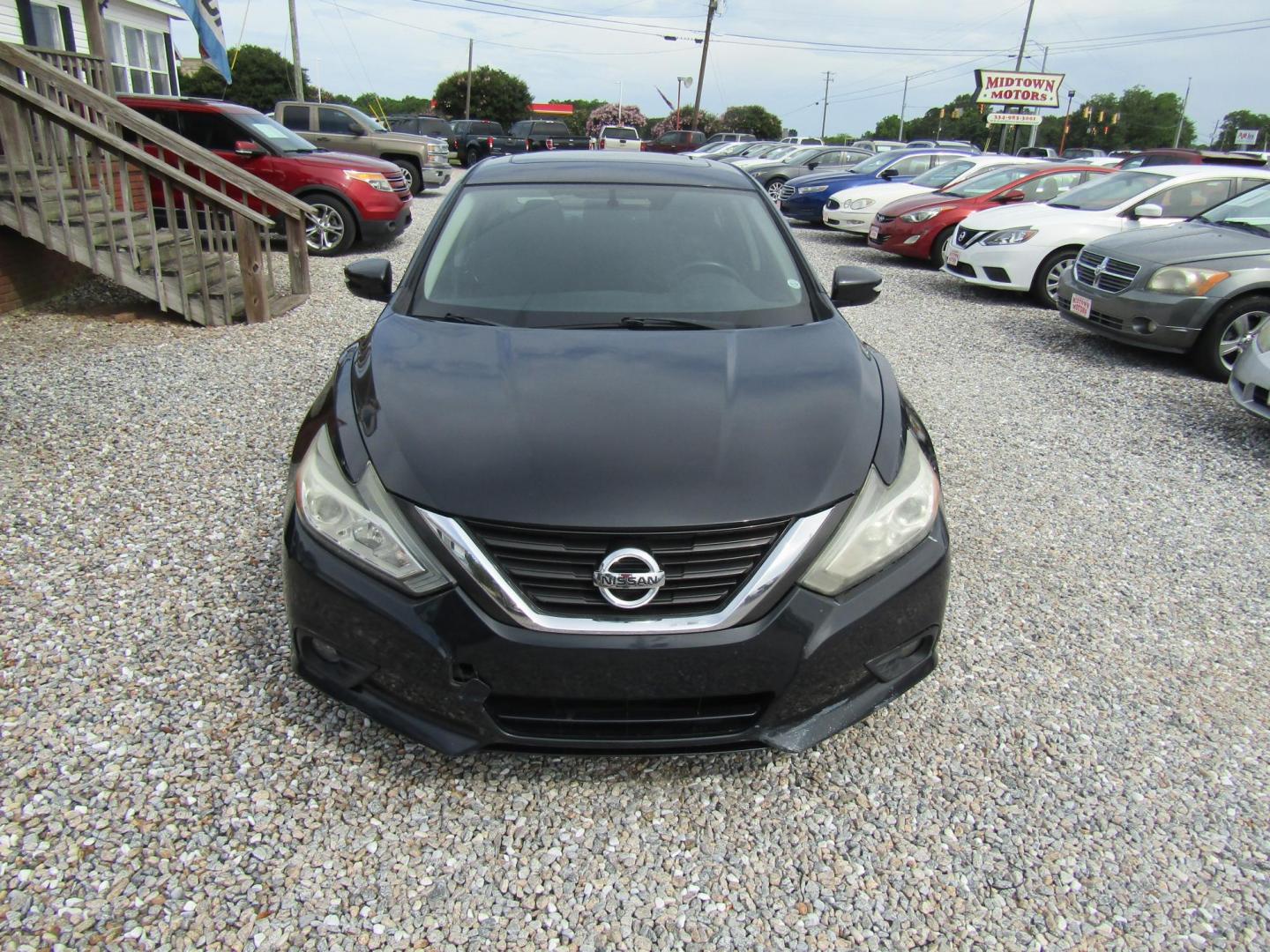 2017 Black Nissan Altima 2.5 S (1N4AL3AP7HC) with an 2.5L L4 DOHC 16V engine, Automatic transmission, located at 15016 S Hwy 231, Midland City, AL, 36350, (334) 983-3001, 31.306210, -85.495277 - Photo#1