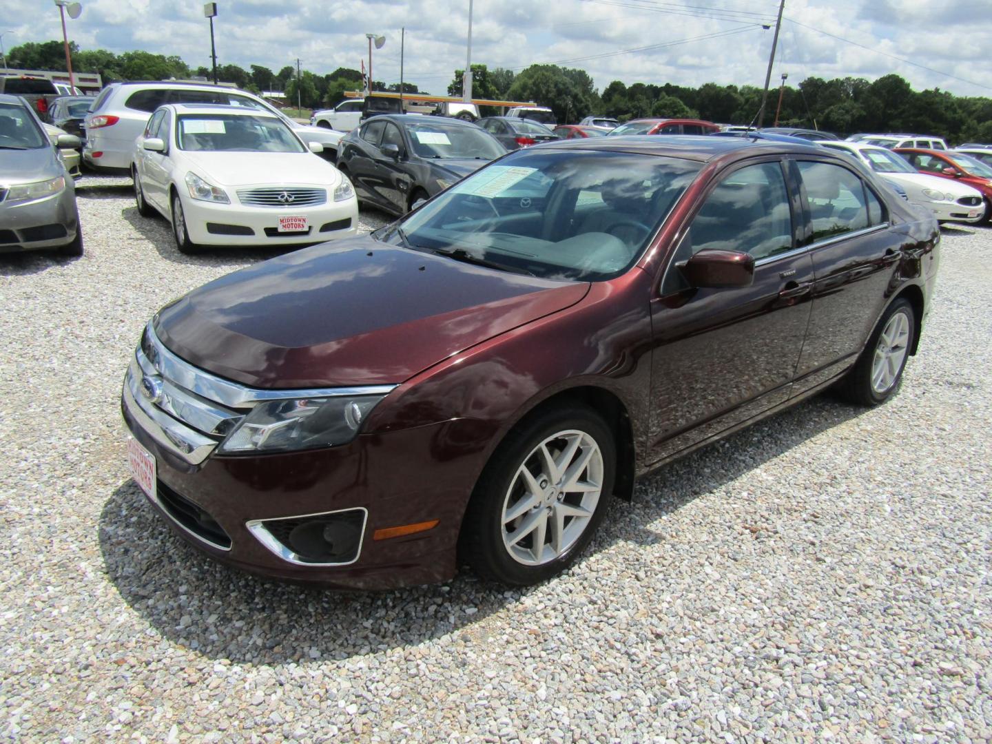 2012 Burgandy Ford Fusion SEL (3FAHP0JA1CR) with an 2.5L L4 DOHC 16V engine, Automatic transmission, located at 15016 S Hwy 231, Midland City, AL, 36350, (334) 983-3001, 31.306210, -85.495277 - Photo#2