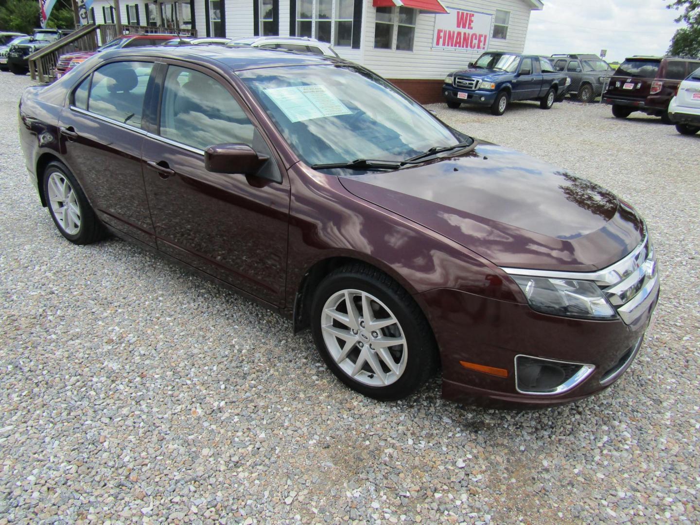 2012 Burgandy Ford Fusion SEL (3FAHP0JA1CR) with an 2.5L L4 DOHC 16V engine, Automatic transmission, located at 15016 S Hwy 231, Midland City, AL, 36350, (334) 983-3001, 31.306210, -85.495277 - Photo#0