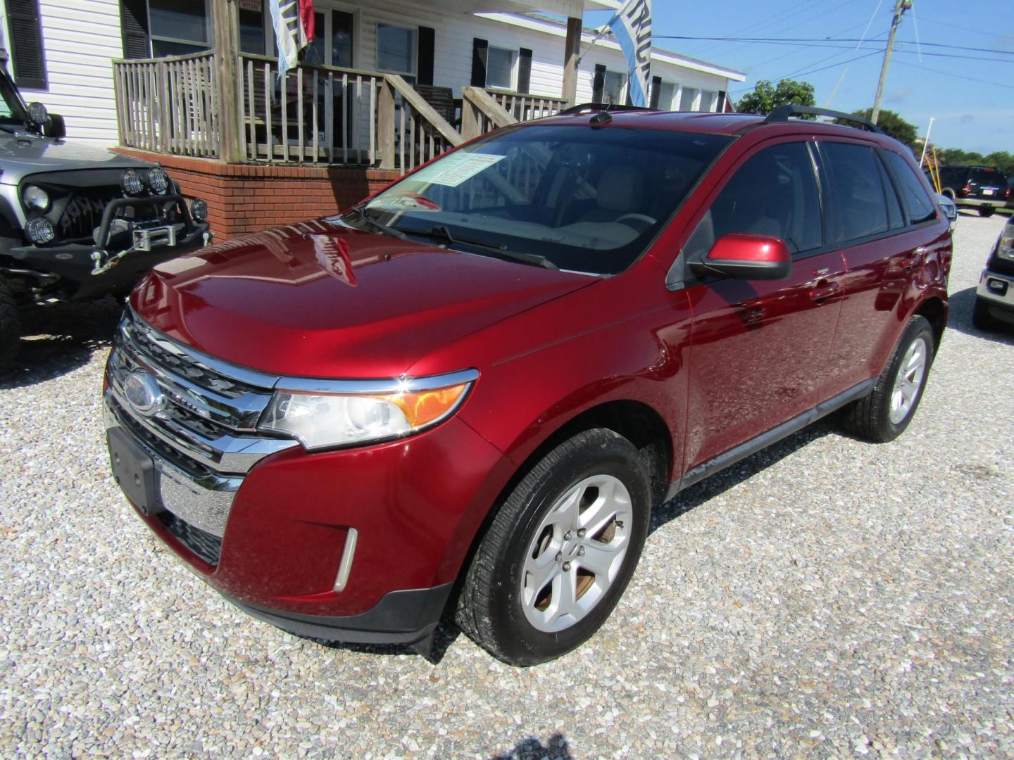 2013 Red Ford Edge SEL FWD (2FMDK3JC6DB) with an 3.5L V6 DOHC 24V engine, Automatic transmission, located at 15016 S Hwy 231, Midland City, AL, 36350, (334) 983-3001, 31.306210, -85.495277 - Photo#2