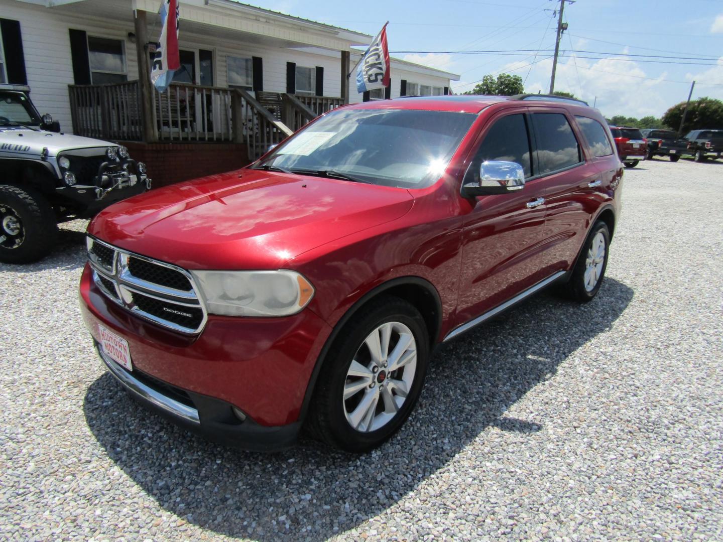 2011 Red Dodge Durango Crew 2WD (1D4SD4GTXBC) with an 5.7L V8 OHV 16V engine, Automatic transmission, located at 15016 S Hwy 231, Midland City, AL, 36350, (334) 983-3001, 31.306210, -85.495277 - Photo#2