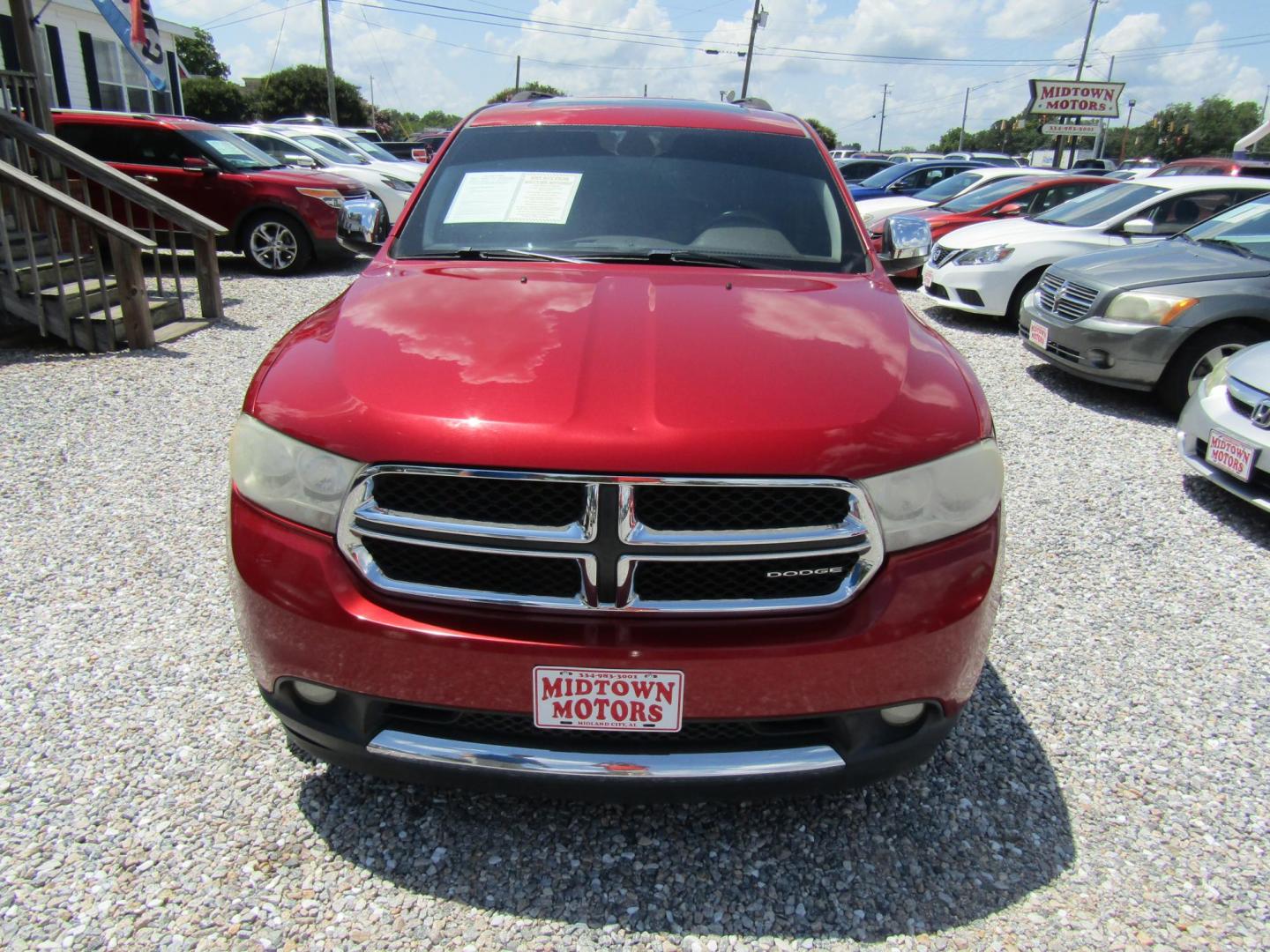 2011 Red Dodge Durango Crew 2WD (1D4SD4GTXBC) with an 5.7L V8 OHV 16V engine, Automatic transmission, located at 15016 S Hwy 231, Midland City, AL, 36350, (334) 983-3001, 31.306210, -85.495277 - Photo#1