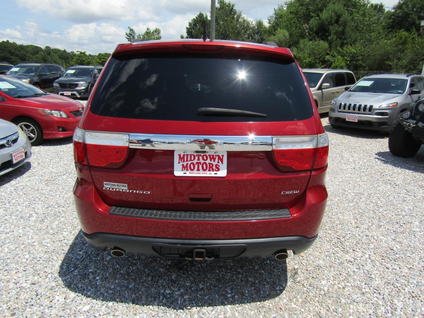 2011 Red Dodge Durango Crew 2WD (1D4SD4GTXBC) with an 5.7L V8 OHV 16V engine, Automatic transmission, located at 15016 S Hwy 231, Midland City, AL, 36350, (334) 983-3001, 31.306210, -85.495277 - Photo#6