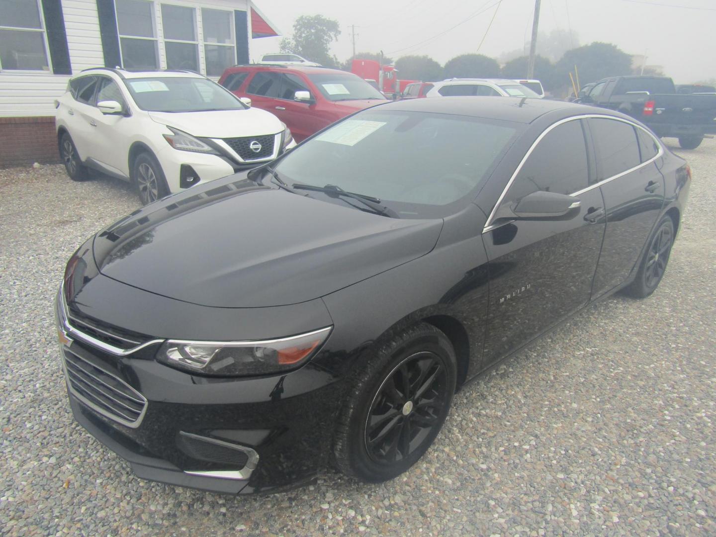 2016 Black Chevrolet Malibu 1LT (1G1ZE5ST0GF) with an 1.5L L4 DOHC 16V engine, Automatic transmission, located at 15016 S Hwy 231, Midland City, AL, 36350, (334) 983-3001, 31.306210, -85.495277 - Photo#2