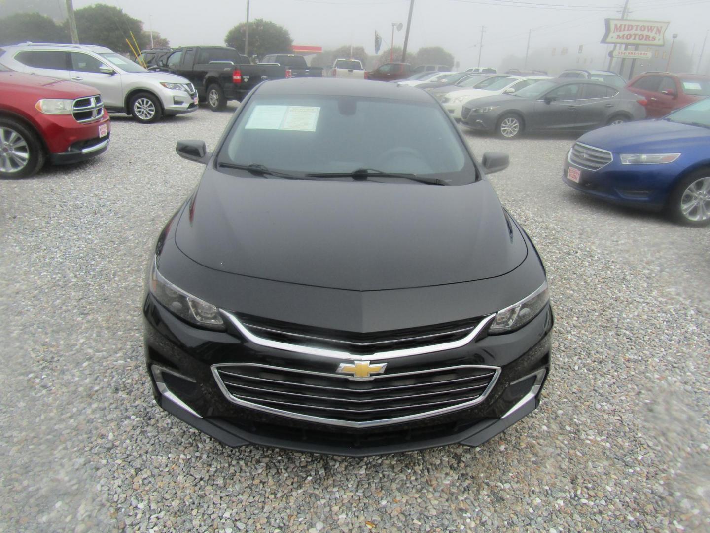 2016 Black Chevrolet Malibu 1LT (1G1ZE5ST0GF) with an 1.5L L4 DOHC 16V engine, Automatic transmission, located at 15016 S Hwy 231, Midland City, AL, 36350, (334) 983-3001, 31.306210, -85.495277 - Photo#1