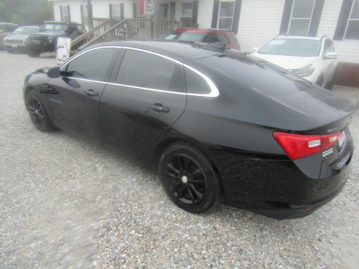 2016 Black Chevrolet Malibu 1LT (1G1ZE5ST0GF) with an 1.5L L4 DOHC 16V engine, Automatic transmission, located at 15016 S Hwy 231, Midland City, AL, 36350, (334) 983-3001, 31.306210, -85.495277 - Photo#5