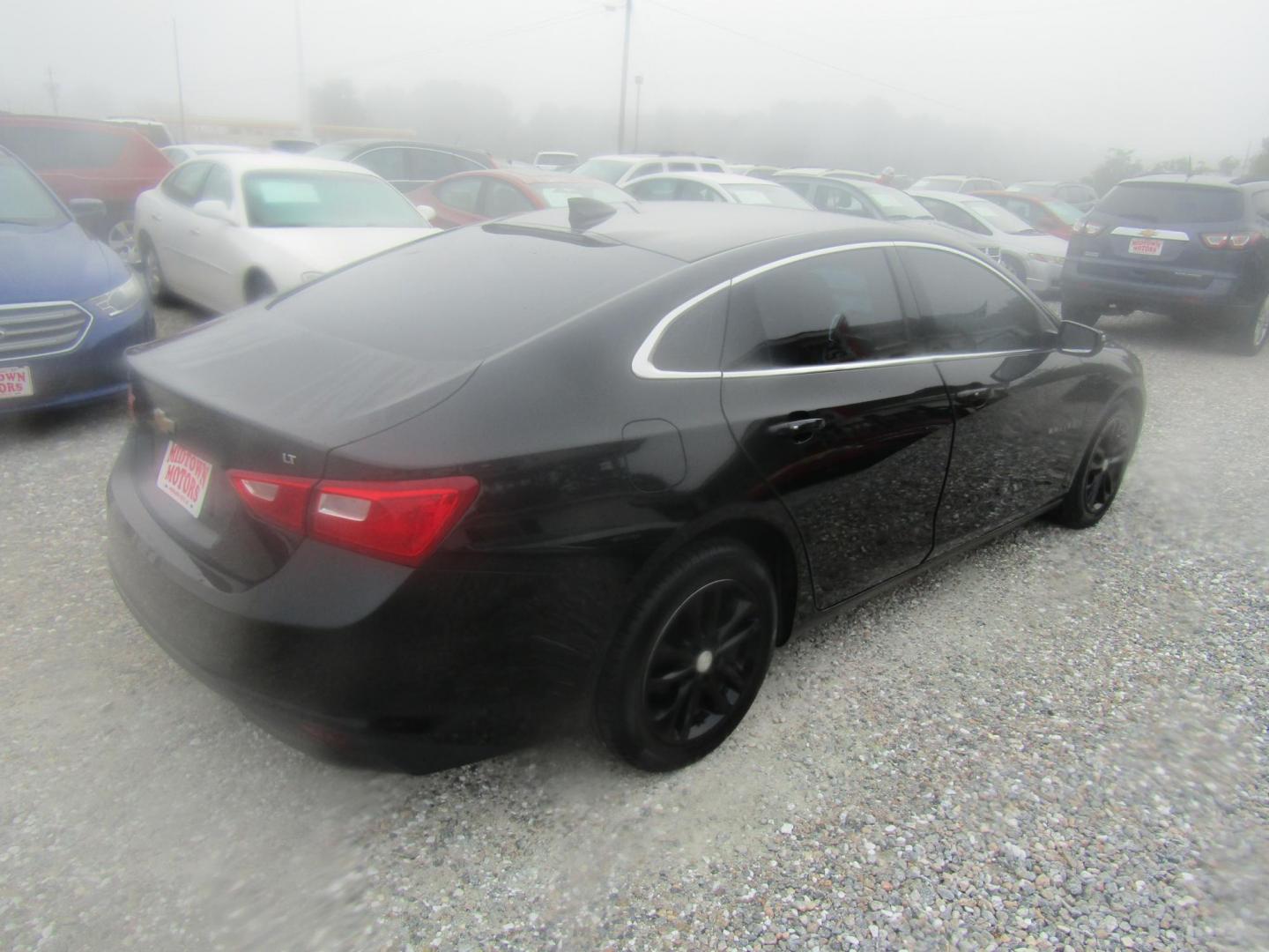 2016 Black Chevrolet Malibu 1LT (1G1ZE5ST0GF) with an 1.5L L4 DOHC 16V engine, Automatic transmission, located at 15016 S Hwy 231, Midland City, AL, 36350, (334) 983-3001, 31.306210, -85.495277 - Photo#7