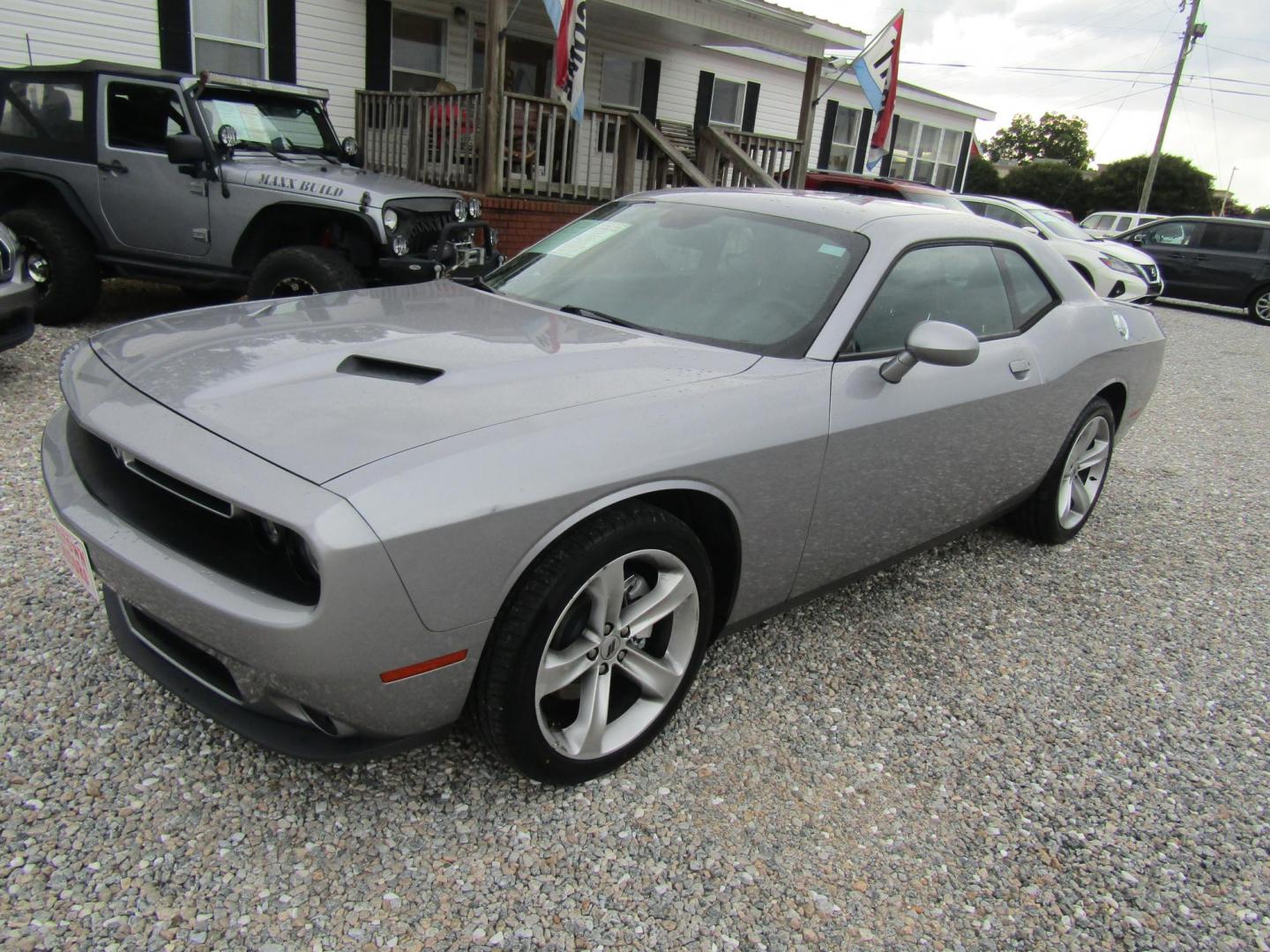 2017 Silver Dodge Challenger SXT (2C3CDZAG2HH) with an 3.6L V6 DOHC 24V engine, Automatic transmission, located at 15016 S Hwy 231, Midland City, AL, 36350, (334) 983-3001, 31.306210, -85.495277 - Photo#2