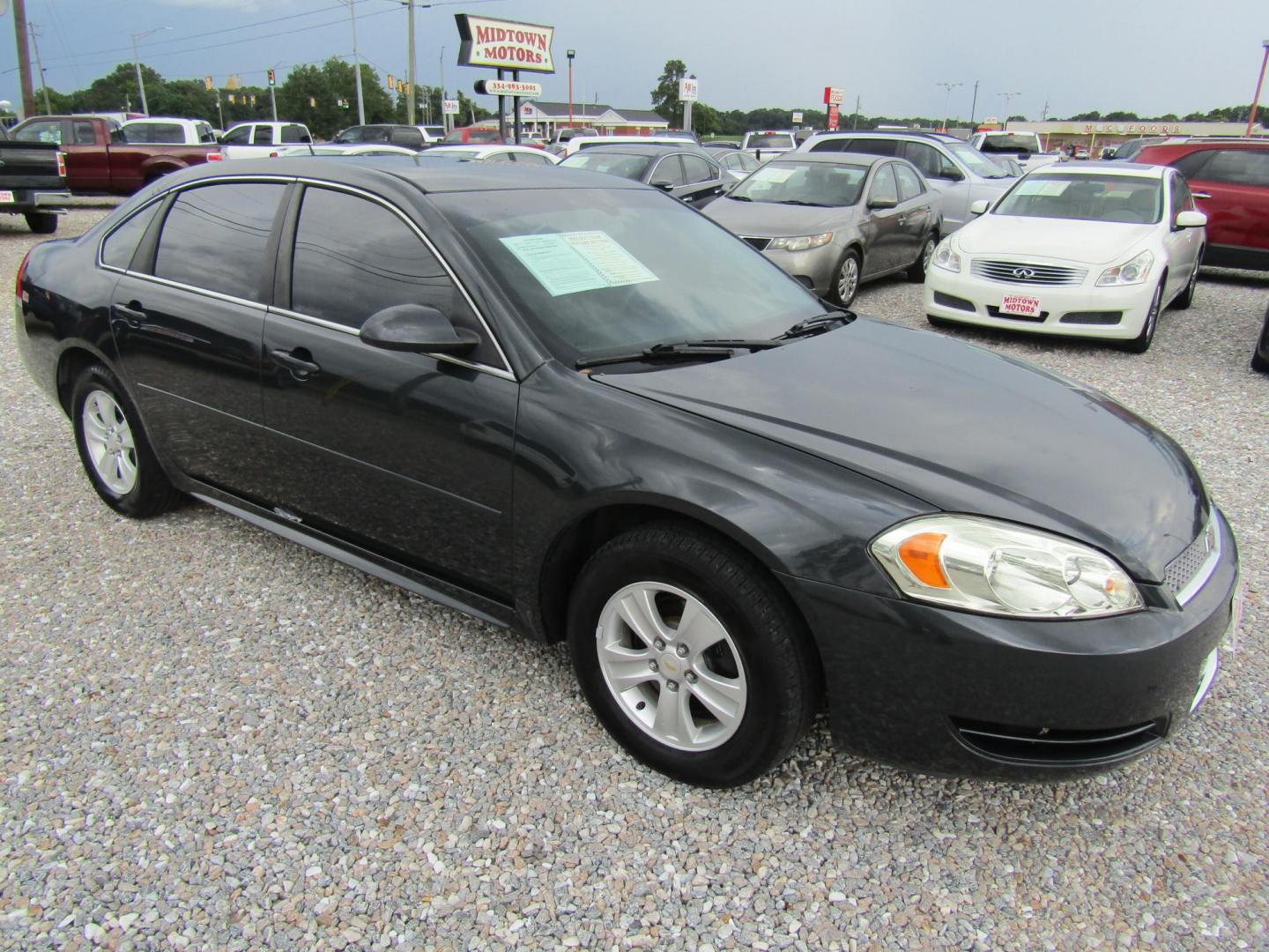 2013 Gray Chevrolet Impala LS (Fleet) (2G1WF5E3XD1) with an 3.6L V6 DOHC 16V FFV engine, Automatic transmission, located at 15016 S Hwy 231, Midland City, AL, 36350, (334) 983-3001, 31.306210, -85.495277 - Photo#0
