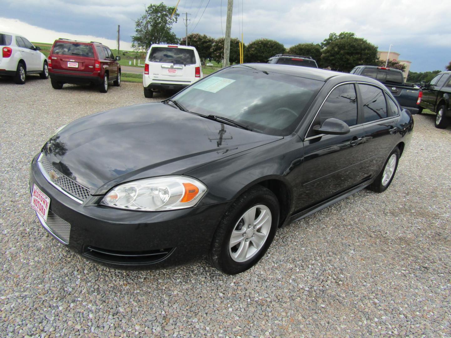 2013 Gray Chevrolet Impala LS (Fleet) (2G1WF5E3XD1) with an 3.6L V6 DOHC 16V FFV engine, Automatic transmission, located at 15016 S Hwy 231, Midland City, AL, 36350, (334) 983-3001, 31.306210, -85.495277 - Photo#2