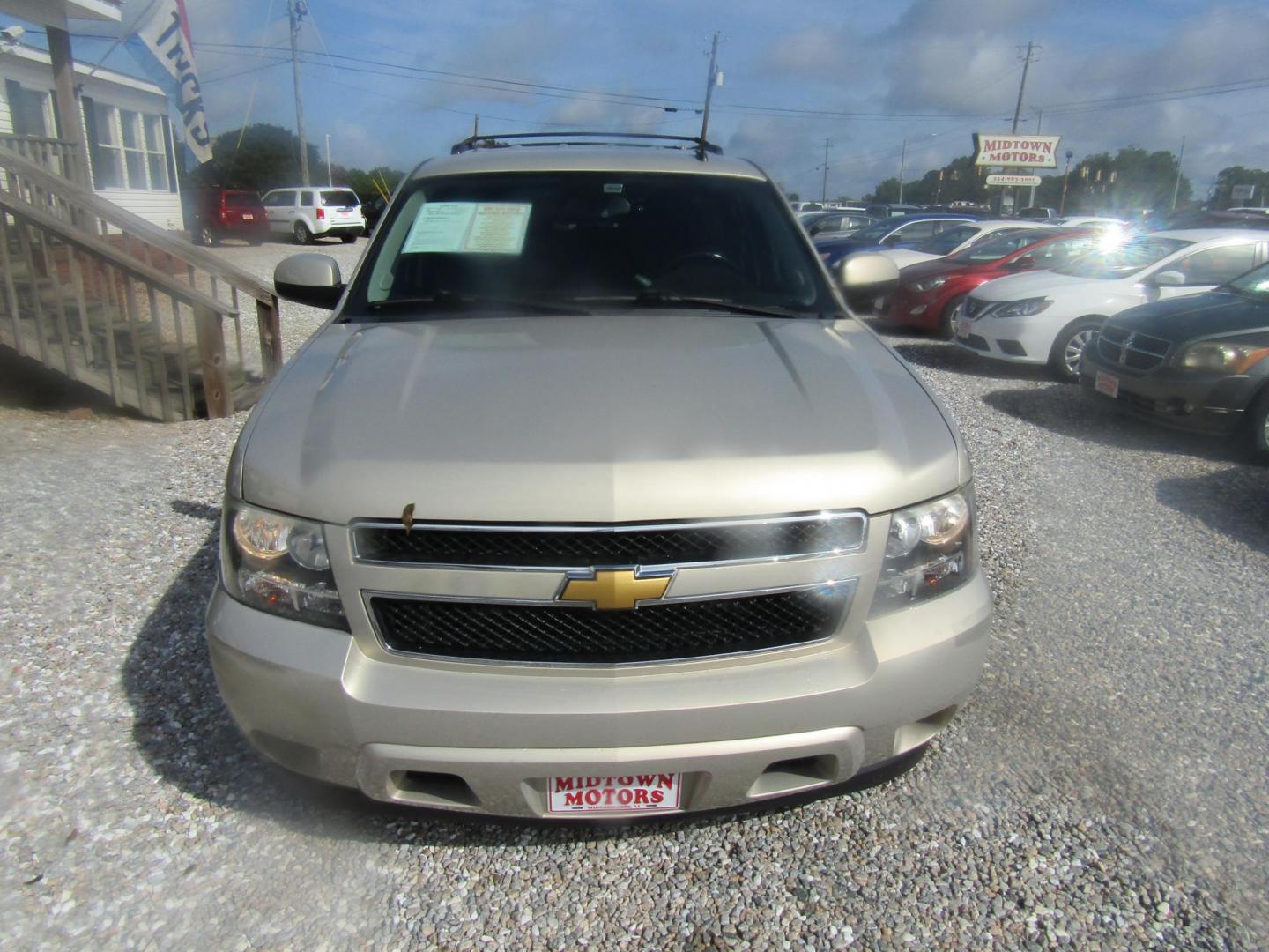 2012 Gold Chevrolet Tahoe LS 2WD (1GNSCAE08CR) with an 5.3L V8 OHV 16V FFV engine, Automatic transmission, located at 15016 S Hwy 231, Midland City, AL, 36350, (334) 983-3001, 31.306210, -85.495277 - Photo#1