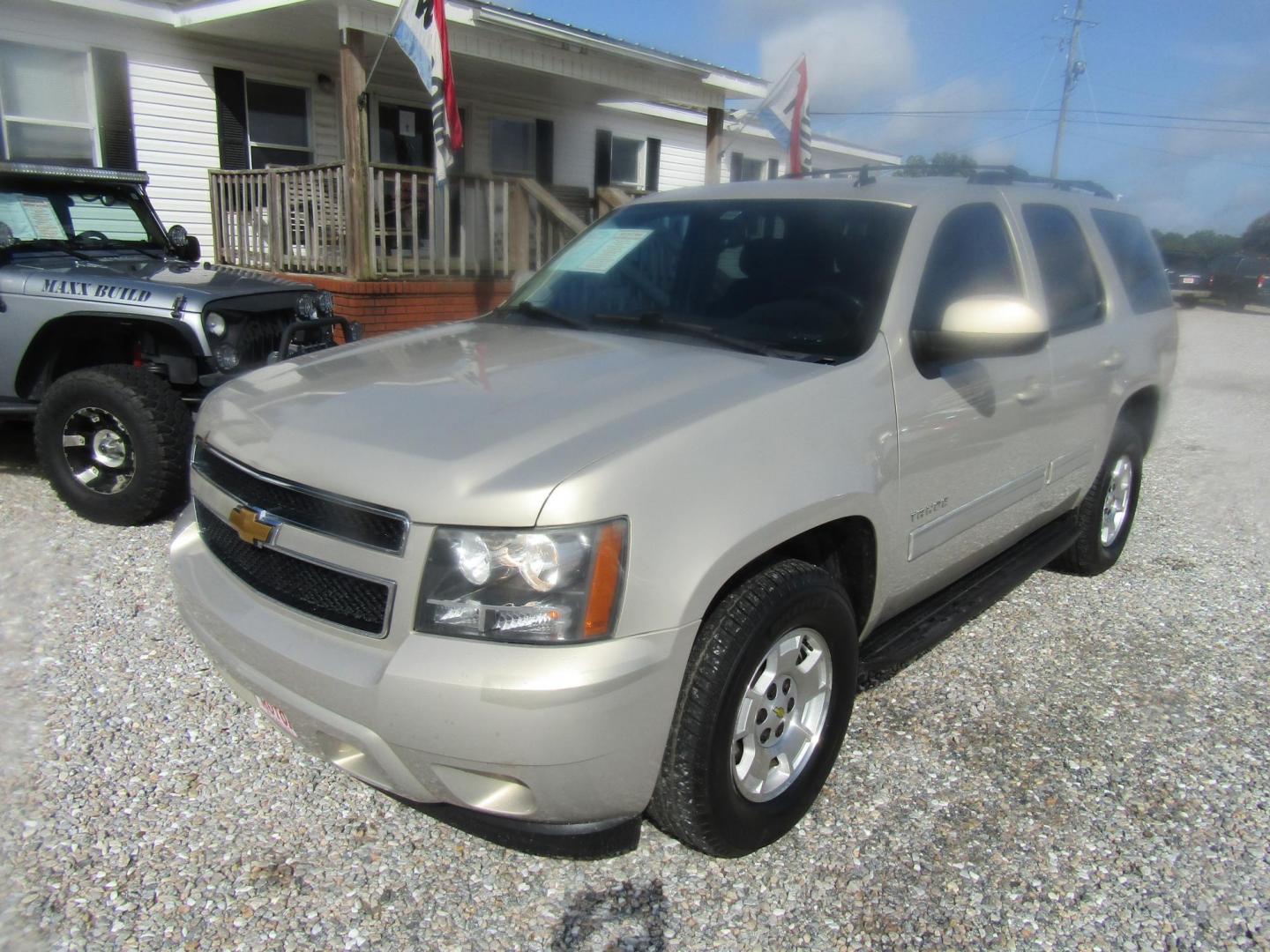 2012 Gold Chevrolet Tahoe LS 2WD (1GNSCAE08CR) with an 5.3L V8 OHV 16V FFV engine, Automatic transmission, located at 15016 S Hwy 231, Midland City, AL, 36350, (334) 983-3001, 31.306210, -85.495277 - Photo#2