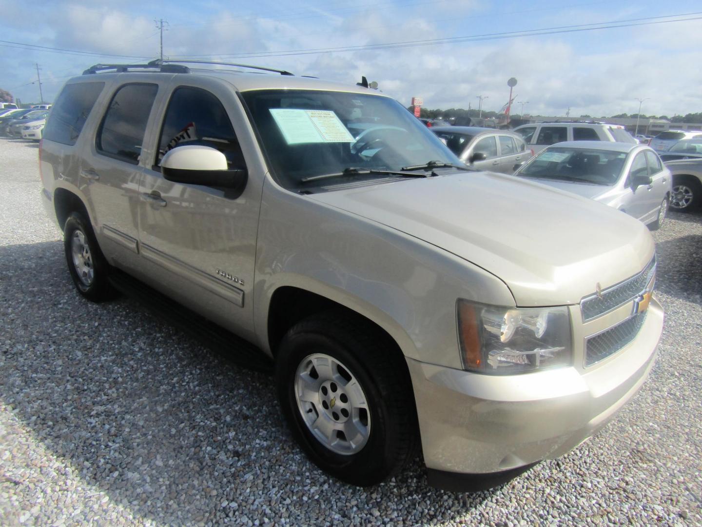 2012 Gold Chevrolet Tahoe LS 2WD (1GNSCAE08CR) with an 5.3L V8 OHV 16V FFV engine, Automatic transmission, located at 15016 S Hwy 231, Midland City, AL, 36350, (334) 983-3001, 31.306210, -85.495277 - Photo#0