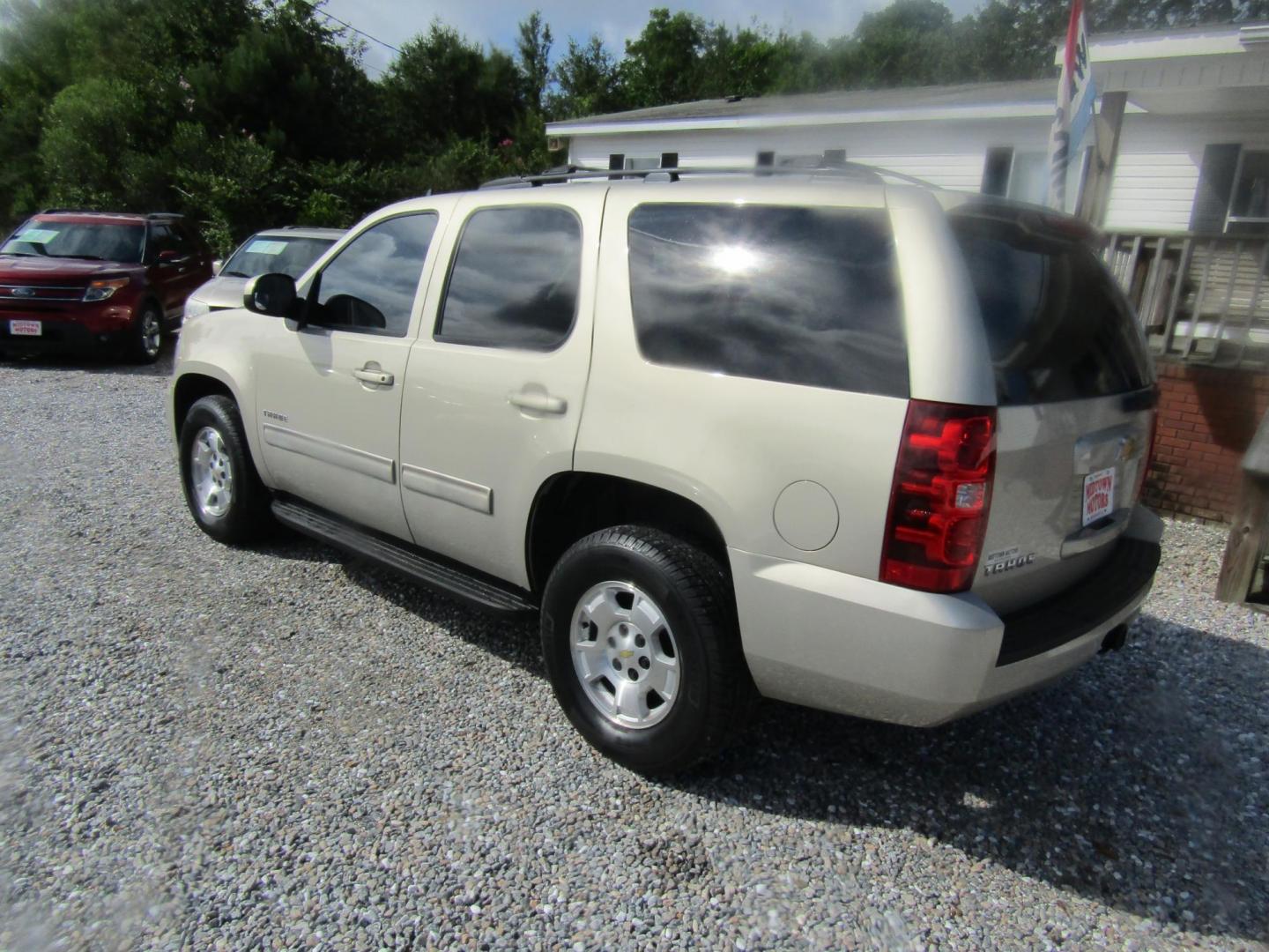 2012 Gold Chevrolet Tahoe LS 2WD (1GNSCAE08CR) with an 5.3L V8 OHV 16V FFV engine, Automatic transmission, located at 15016 S Hwy 231, Midland City, AL, 36350, (334) 983-3001, 31.306210, -85.495277 - Photo#5