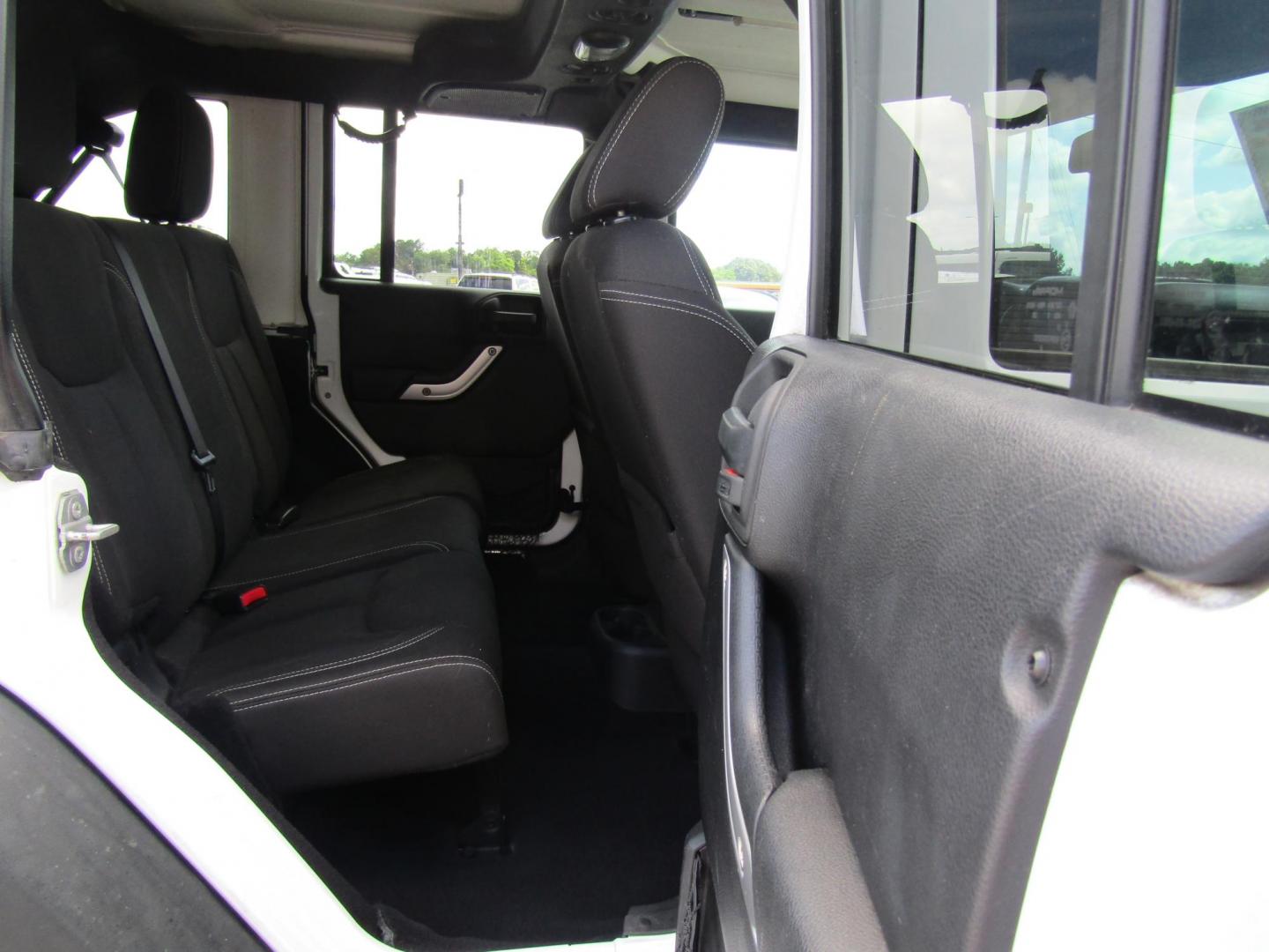 2015 WHITE Jeep Wrangler Unlimited Rubicon 4WD (1C4BJWFG6FL) with an 3.6L V6 DOHC 24V FFV engine, Automatic transmission, located at 15016 S Hwy 231, Midland City, AL, 36350, (334) 983-3001, 31.306210, -85.495277 - Photo#4