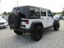 2015 WHITE Jeep Wrangler Unlimited Rubicon 4WD (1C4BJWFG6FL) with an 3.6L V6 DOHC 24V FFV engine, Automatic transmission, located at 15016 S Hwy 231, Midland City, AL, 36350, (334) 983-3001, 31.306210, -85.495277 - Photo#5