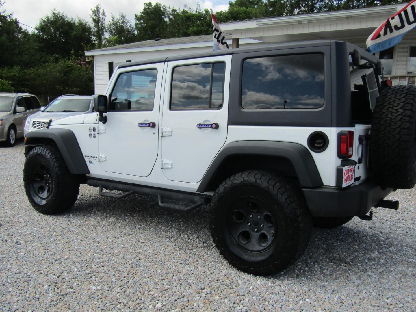 2015 WHITE Jeep Wrangler Unlimited Rubicon 4WD (1C4BJWFG6FL) with an 3.6L V6 DOHC 24V FFV engine, Automatic transmission, located at 15016 S Hwy 231, Midland City, AL, 36350, (334) 983-3001, 31.306210, -85.495277 - Photo#7